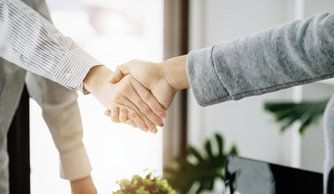 Two people shaking hands