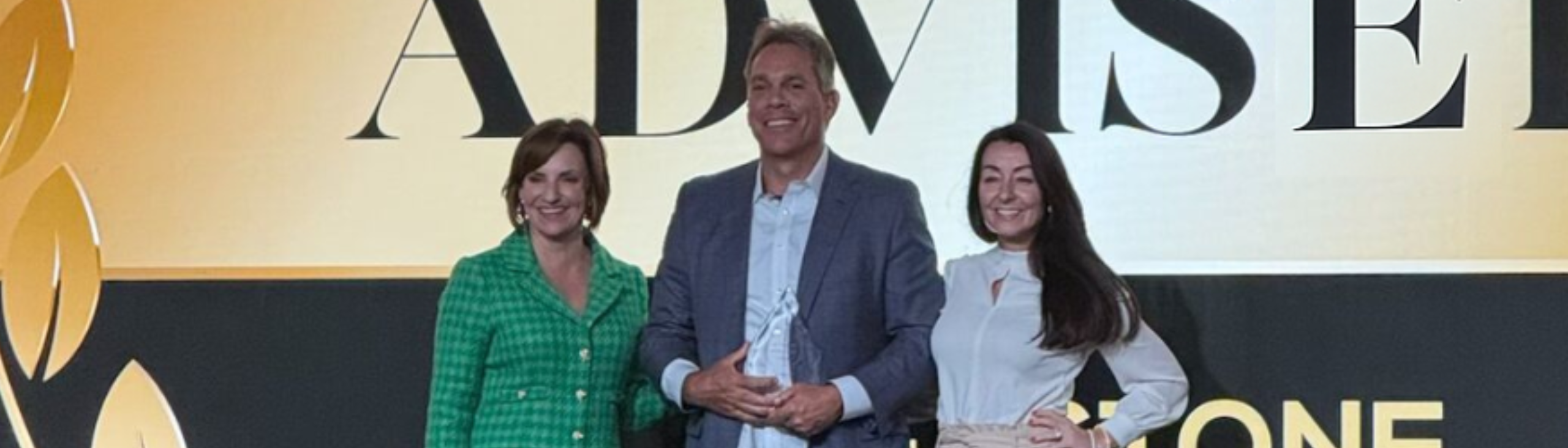 HAWK Advisers accepting the 2025 Partner of the Year Award